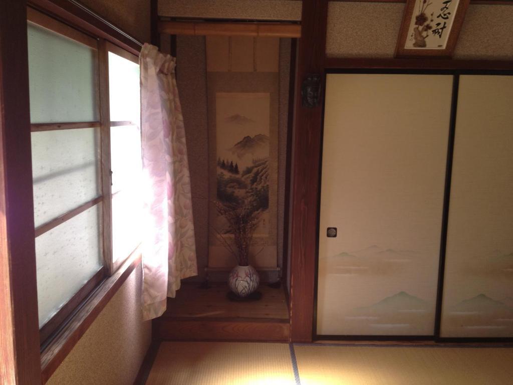 Choyomon Hotel Nanto Habitación foto